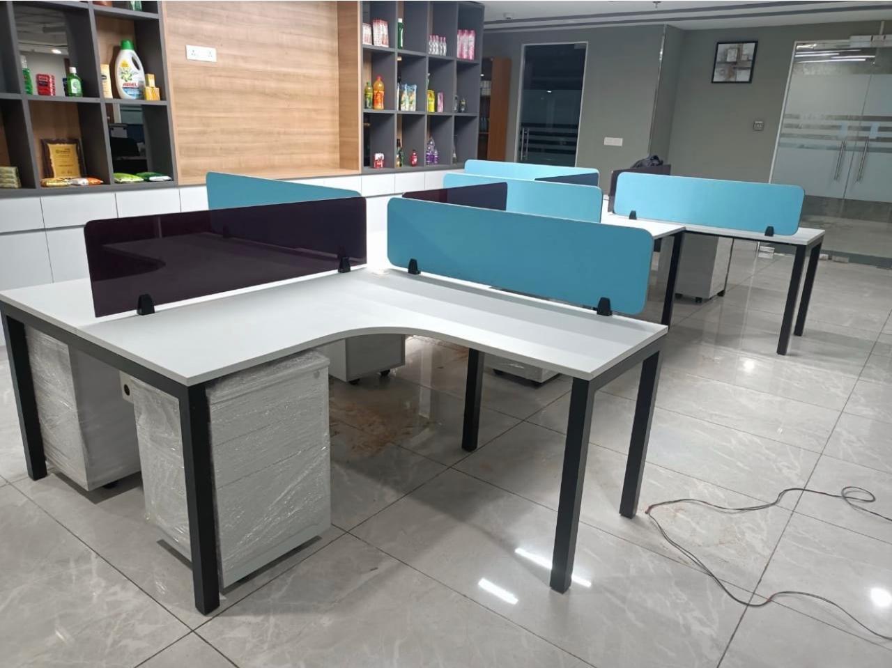 L-shape corner workstation cluster with teal dividers